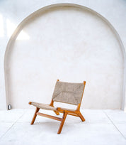 Solid teak wood lounge chair side view
