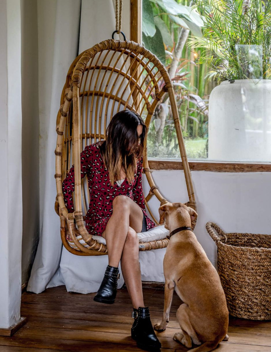 Durable handmade natural rattan hanging swing chair single, designed for relaxing indoor or outdoor comfort.