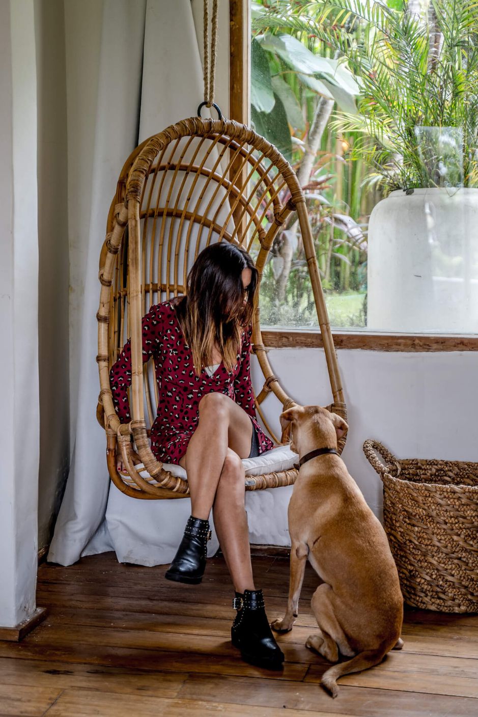 Durable handmade natural rattan hanging swing chair single, designed for relaxing indoor or outdoor comfort.