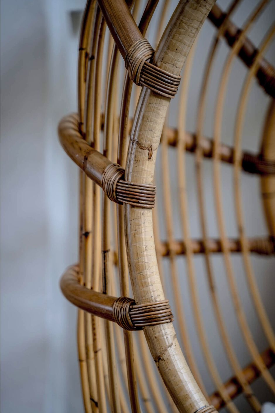 Durable handmade natural rattan hanging swing chair single, designed for relaxing indoor or outdoor comfort.