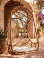 Handwoven rattan hanging chair with natural woven texture