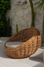 Ingka Halo cognac handmade rattan sofa lounge chair with thick weave, modern minimalist design for living rooms and lounges.