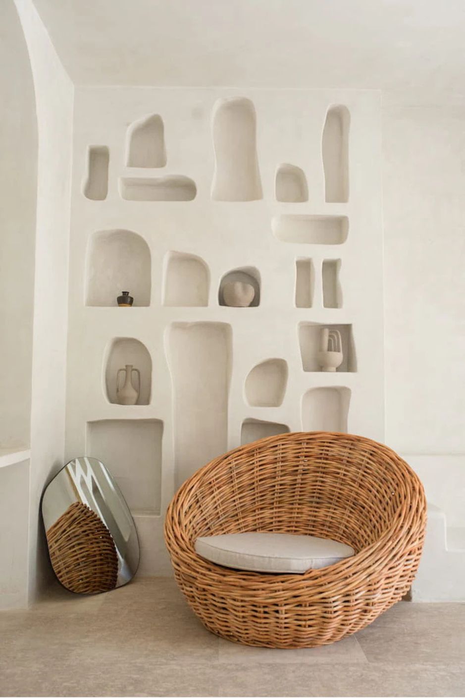 Ingka Halo cognac handmade rattan sofa lounge chair with thick weave, modern minimalist design for living rooms and lounges.