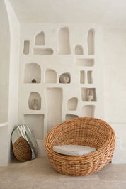 Ingka Halo cognac handmade rattan sofa lounge chair with thick weave, modern minimalist design for living rooms and lounges.