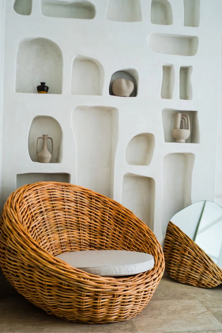 Ingka Halo cognac handmade rattan sofa lounge chair with thick weave, modern minimalist design for living rooms and lounges.