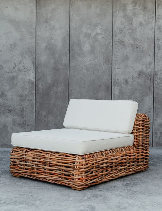 Handmade Ingka modular armchair in cognac rattan with thick weave, versatile as standalone chair or part of modular sofa for living room, terrace, or patio.