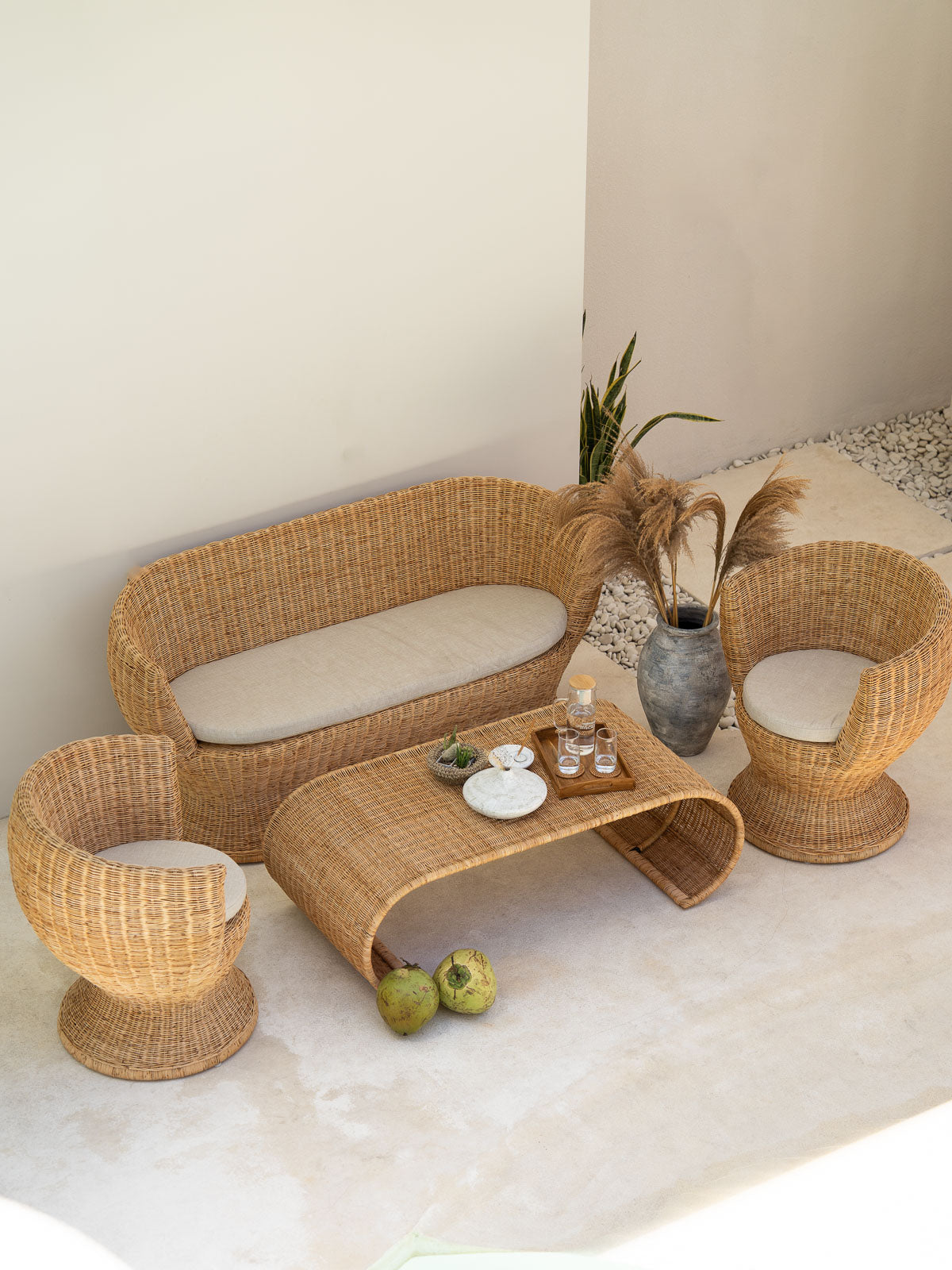 Handcrafted rattan lounge chair with natural finish
