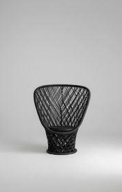 Black woven chair on a light gray background