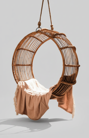 Wicker hanging chair with a blanket ,round 