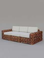 Modern organic rattan sofa for living room
Rattan accent sofa placed in bedroom interior