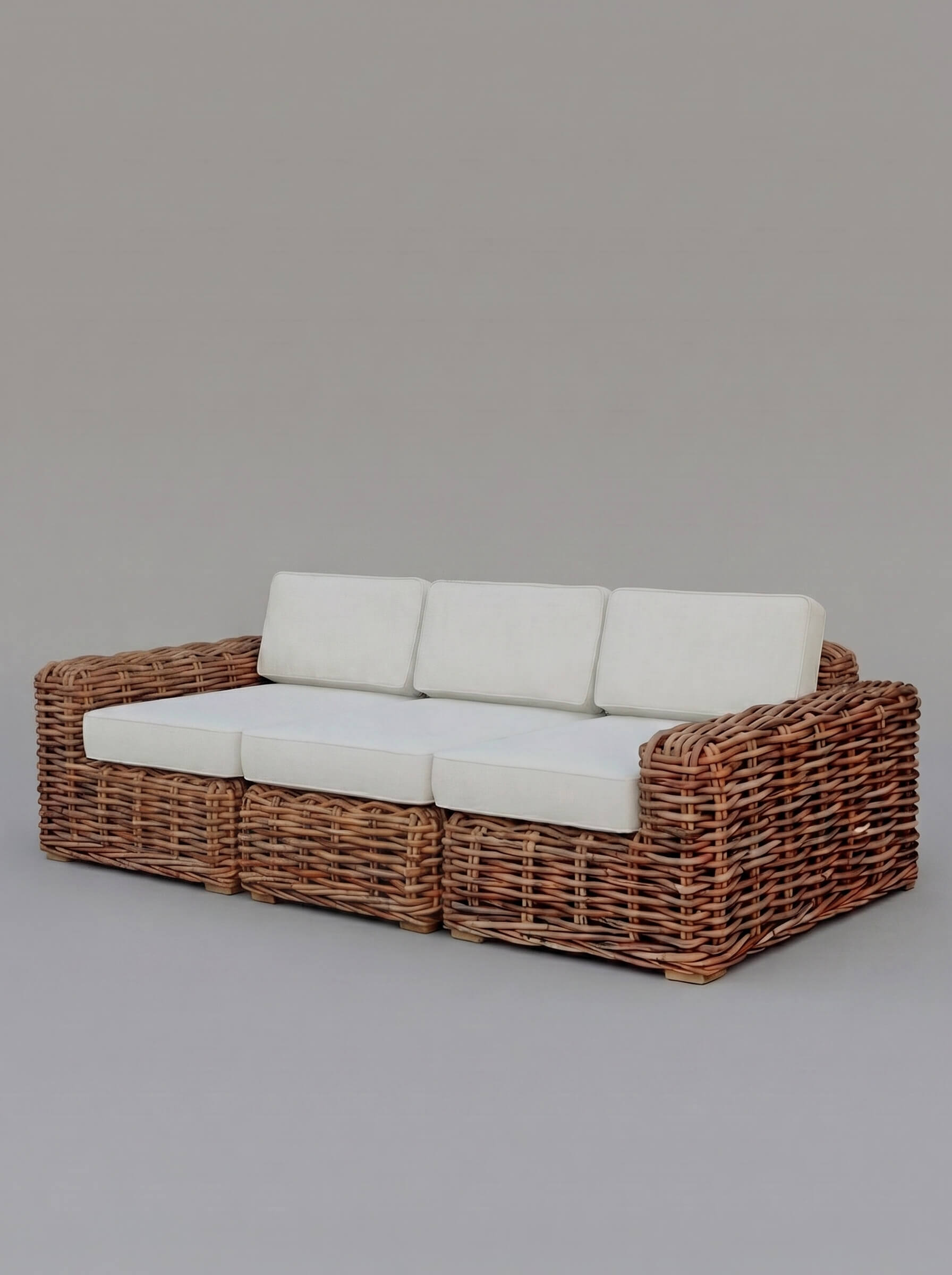Modern organic rattan sofa for living room
Rattan accent sofa placed in bedroom interior