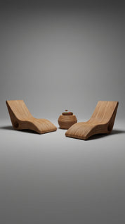 Wooden lounge chairs and a small table on a gray background