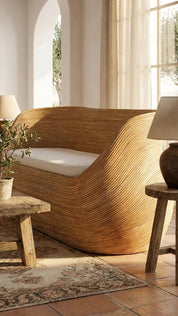Woven wooden chair in a sunlit room with natural light