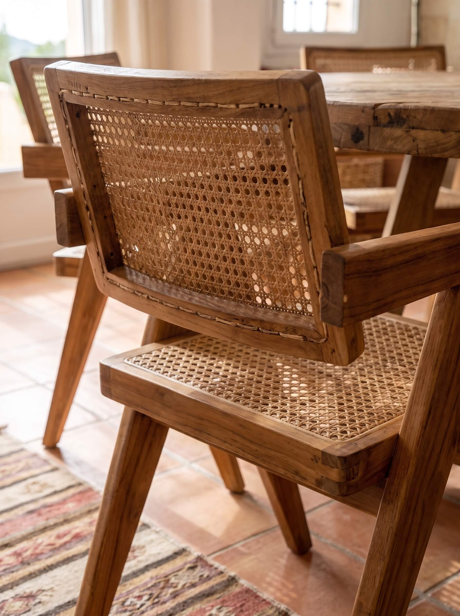 Back detail of solid teak wood chair
Teak wood armchair with natural finish
