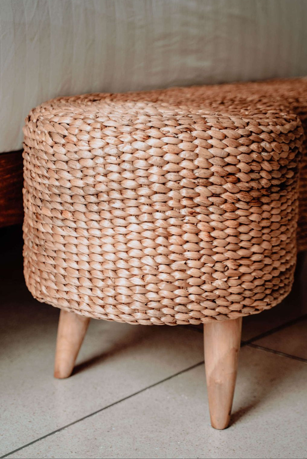 Ellina and Bellina Ottoman Benches, handcrafted water hyacinth with wooden legs, versatile seating for modern and scandinavian interiors