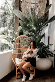 Handmade Milo Rattan Chair with wooden legs in natural colour, boho style seating for living room, bedroom, patio, or garden