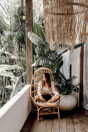 Handmade Milo Rattan Chair with wooden legs in natural colour, boho style seating for living room, bedroom, patio, or garden