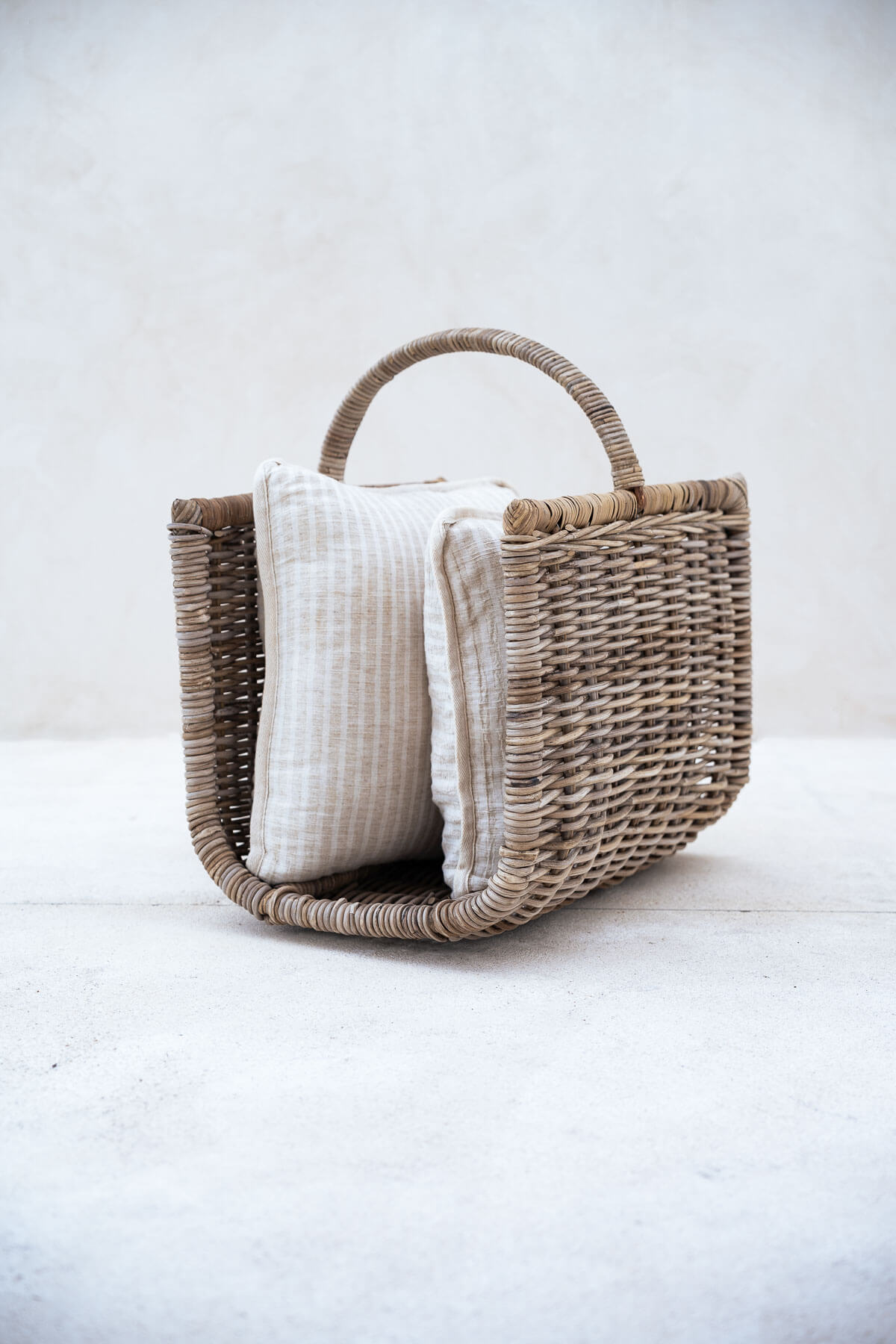 Woven basket with a white fabric