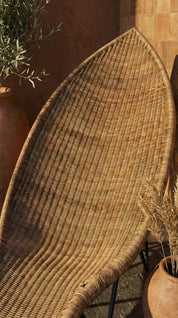  Natural rattan chair with handcrafted detailing