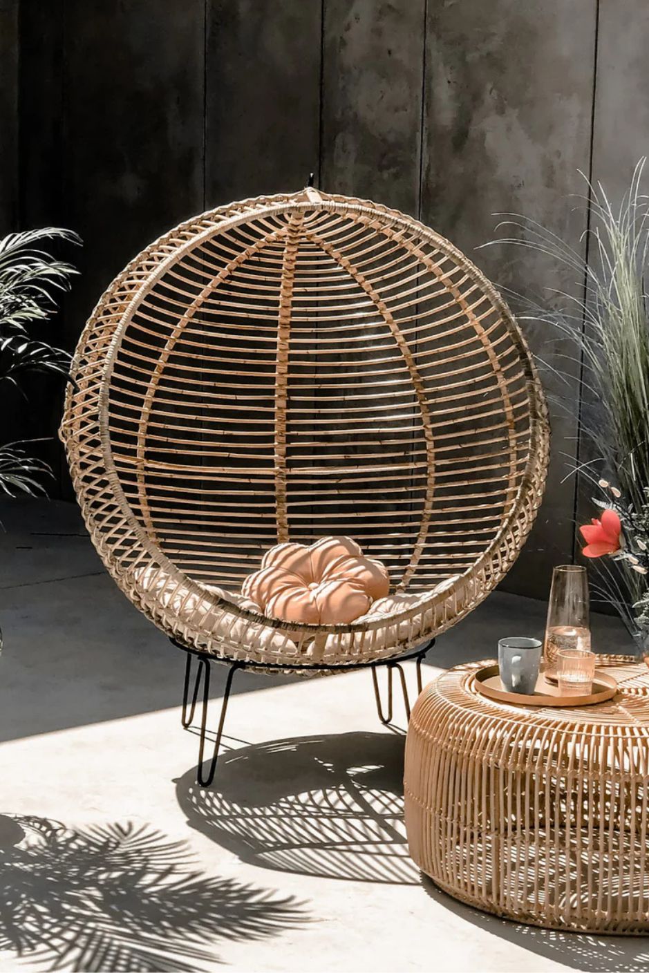 Hanging and standing rattan ball swing chair for adults and kids, available in single adult and junior sizes, handmade natural rattan, includes metal stand and rope, perfect for patio, garden, deck, or poolside, stylish boho, modern, and classic interior accessory.