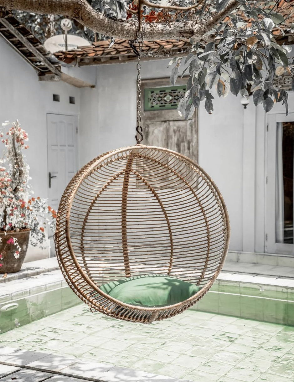Hanging and standing rattan ball swing chair for adults and kids, available in single adult and junior sizes, handmade natural rattan, includes metal stand and rope, perfect for patio, garden, deck, or poolside, stylish boho, modern, and classic interior accessory.