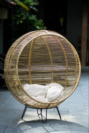 Hanging and standing rattan ball swing chair for adults and kids, available in single adult and junior sizes, handmade natural rattan, includes metal stand and rope, perfect for patio, garden, deck, or poolside, stylish boho, modern, and classic interior accessory.