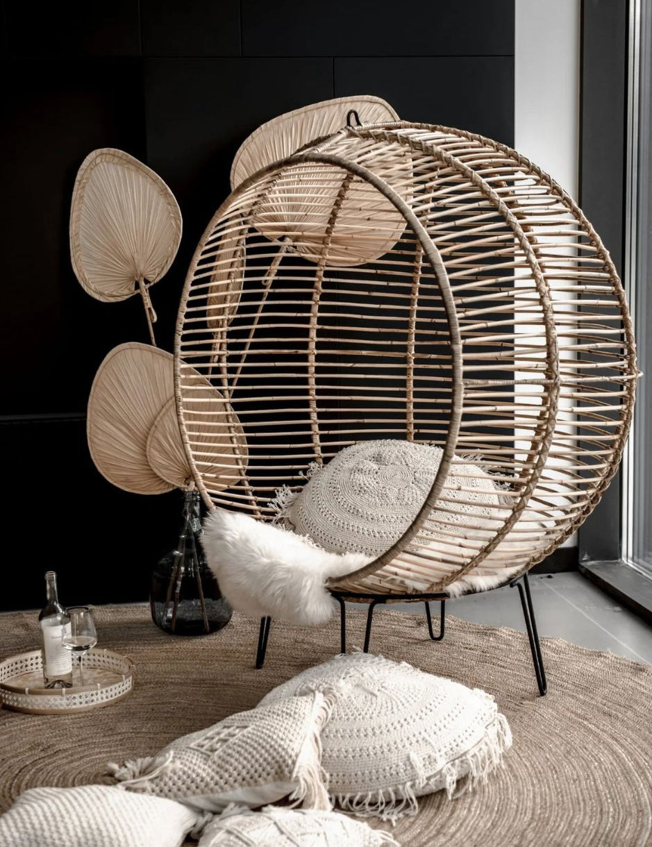 Hanging and standing rattan ball swing chair for adults and kids, available in single adult and junior sizes, handmade natural rattan, includes metal stand and rope, perfect for patio, garden, deck, or poolside, stylish boho, modern, and classic interior accessory.