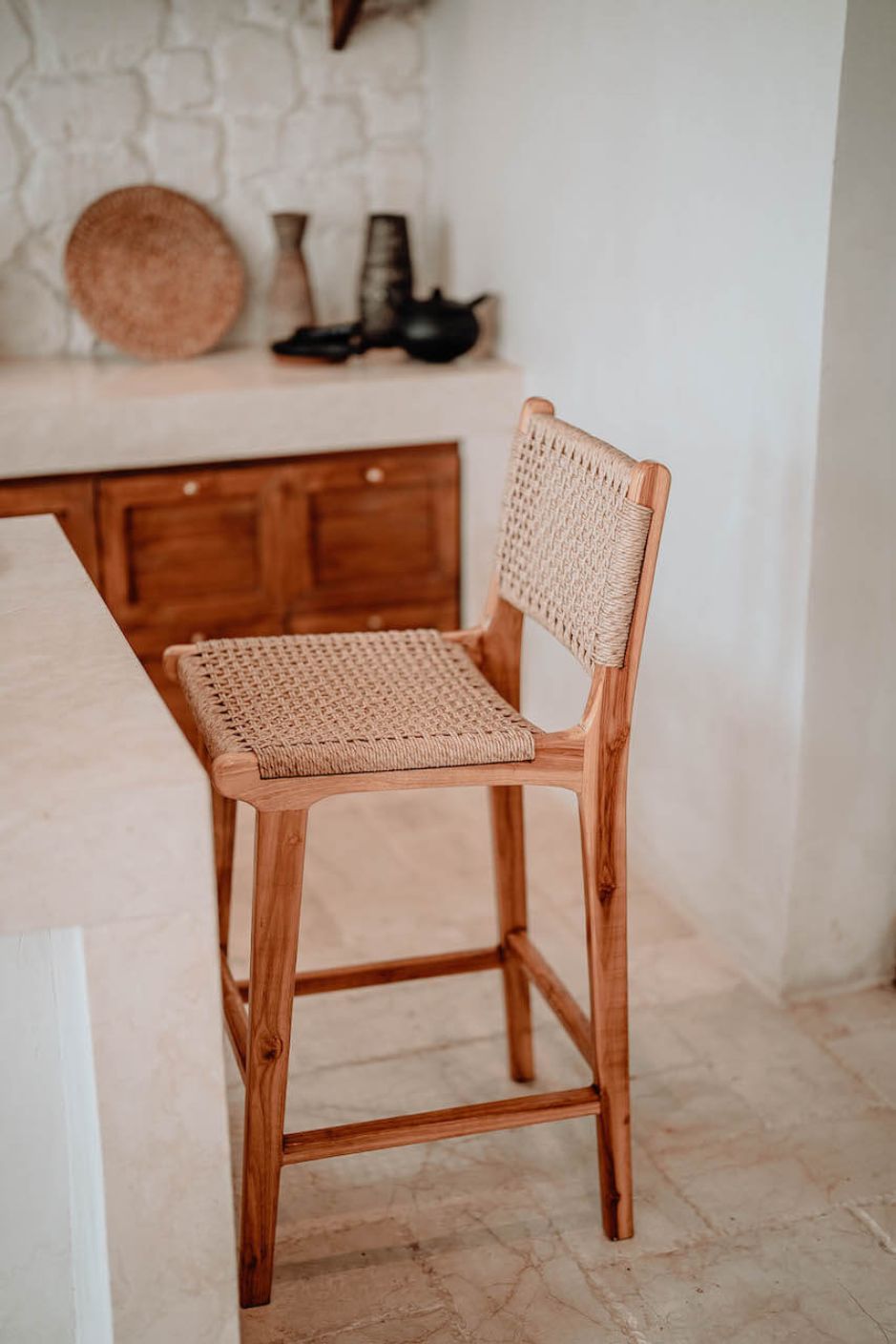 Handmade Harrison teak bar stool with woven synthetic seat and backrest, stylish and durable high chair for kitchen counters or bar tables, perfect for modern Australian interiors.