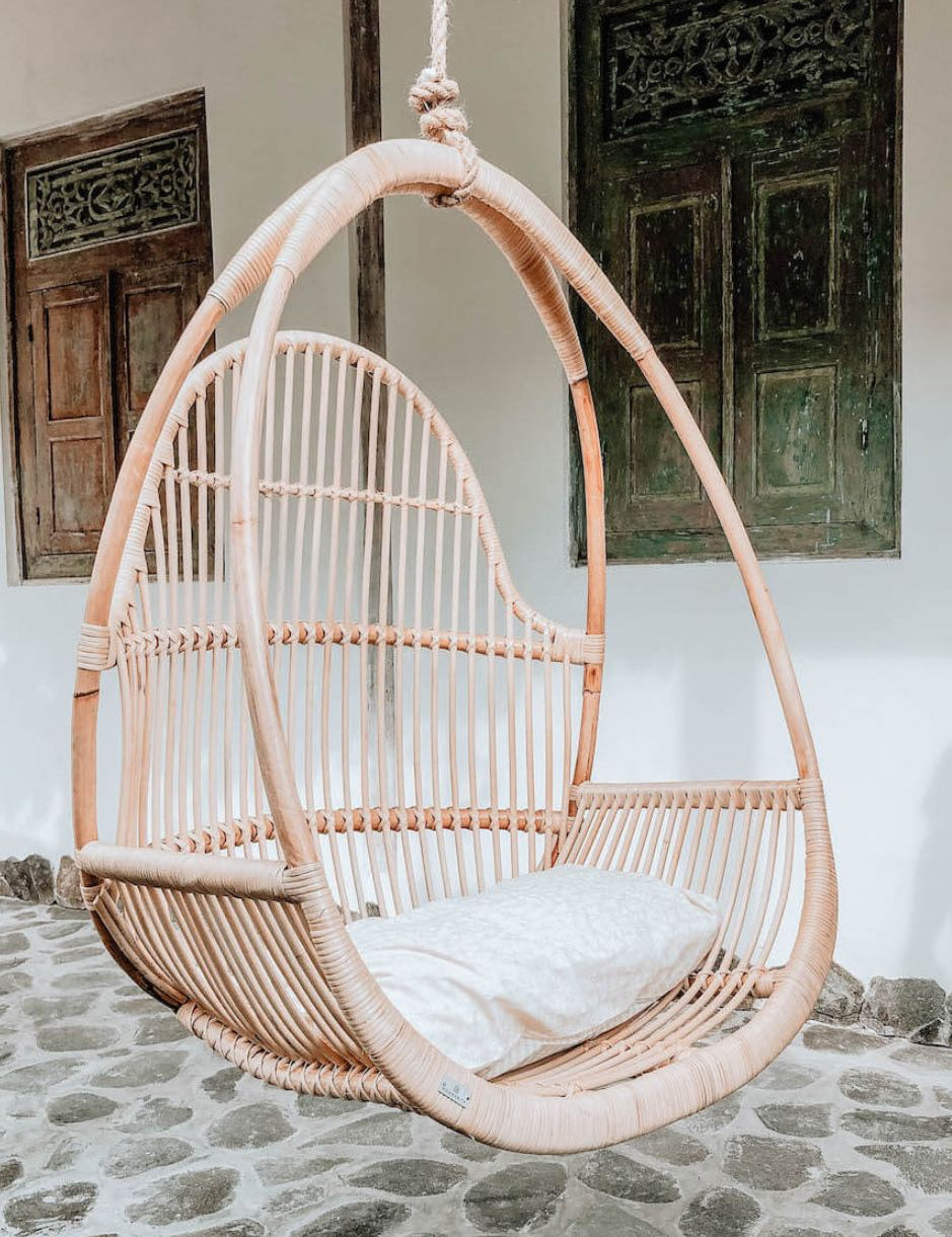 Henry single or double handmade durable light rattan hanging chair for indoor living rooms, covered terraces, patios, balconies, and outdoor gardens