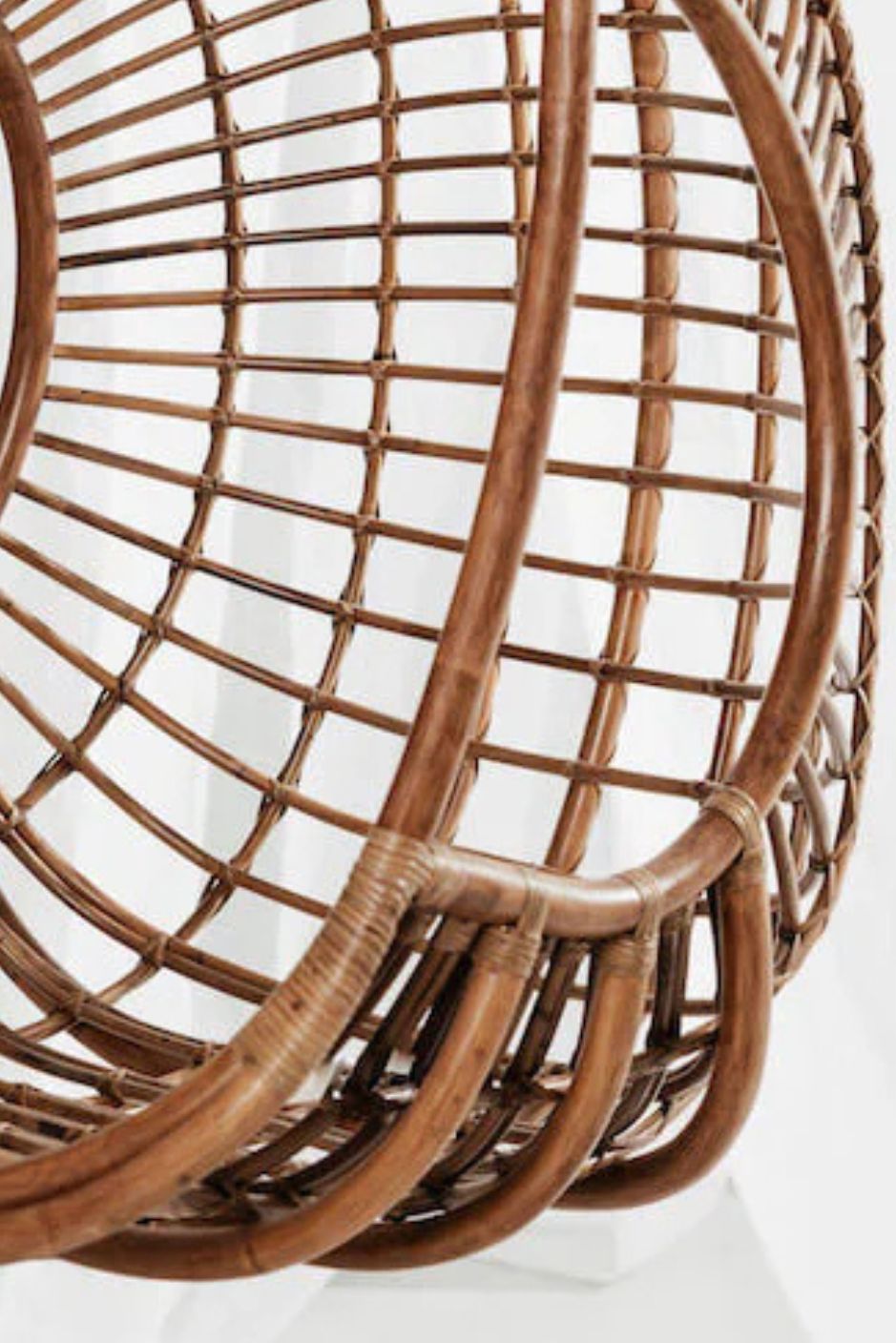 Hugo Rattan Hanging Chair in natural, cognac and brown rattan, handmade, eco-friendly, zero plastic, boho style, perfect for living room, terrace, or patio, stylish and comfortable swinging chair for modern or island-inspired interiors.