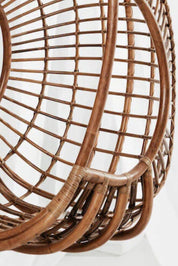 Hugo Rattan Hanging Chair in natural, cognac and brown rattan, handmade, eco-friendly, zero plastic, boho style, perfect for living room, terrace, or patio, stylish and comfortable swinging chair for modern or island-inspired interiors.