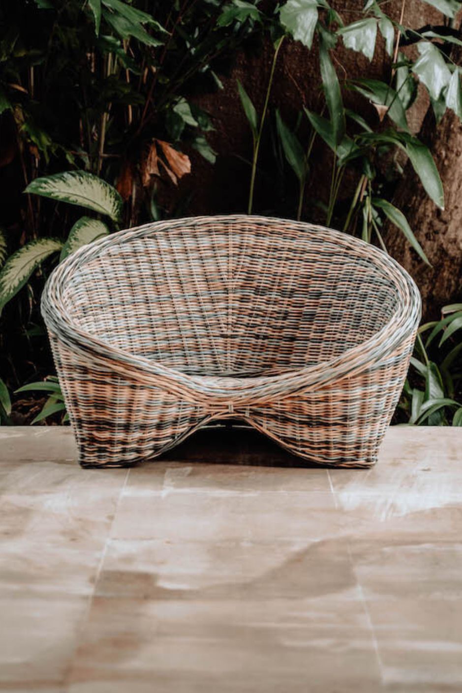 Indiana Yoga Chair handcrafted from sustainable rattan wood in natural and grey tones, ergonomic backrest and curved armrests for yoga, meditation, or relaxation, lightweight and eco-friendly indoor and outdoor seating