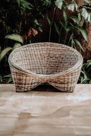 Indiana Yoga Chair handcrafted from sustainable rattan wood in natural and grey tones, ergonomic backrest and curved armrests for yoga, meditation, or relaxation, lightweight and eco-friendly indoor and outdoor seating