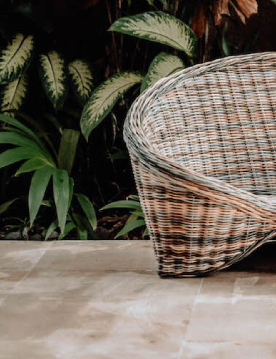 Indiana Yoga Chair handcrafted from sustainable rattan wood in natural and grey tones, ergonomic backrest and curved armrests for yoga, meditation, or relaxation, lightweight and eco-friendly indoor and outdoor seating