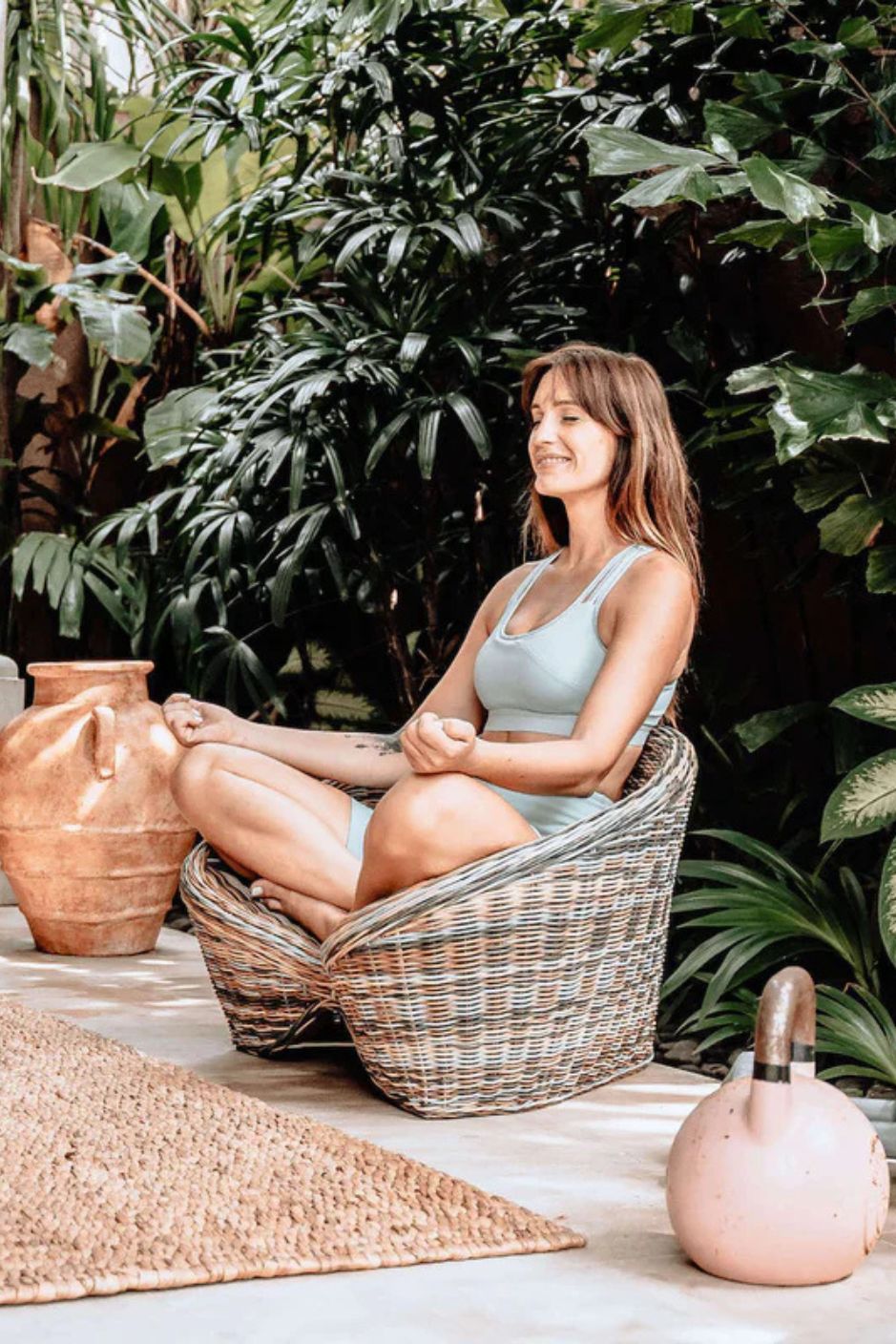 Indiana Yoga Chair handcrafted from sustainable rattan wood in natural and grey tones, ergonomic backrest and curved armrests for yoga, meditation