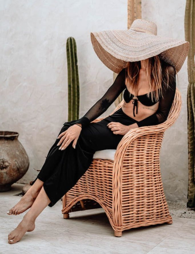 Handmade Ingka Alo cognac rattan chair with thick weave, natural tones, perfect for modern living spaces