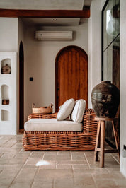 Natural rattan chair placed in modern interior
