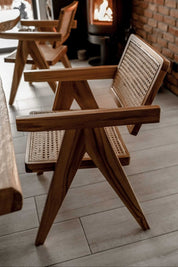 Joy Chair handmade from durable teak wood with woven rattan seat and backrest – stylish eco-friendly dining chair for modern homes.