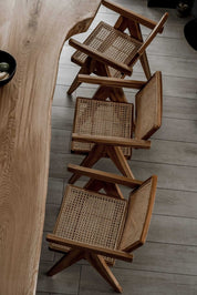 Joy Chair handmade from durable teak wood with woven rattan seat and backrest – stylish eco-friendly dining chair for modern homes.