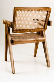 Wooden chair with wicker back and seat on a white background