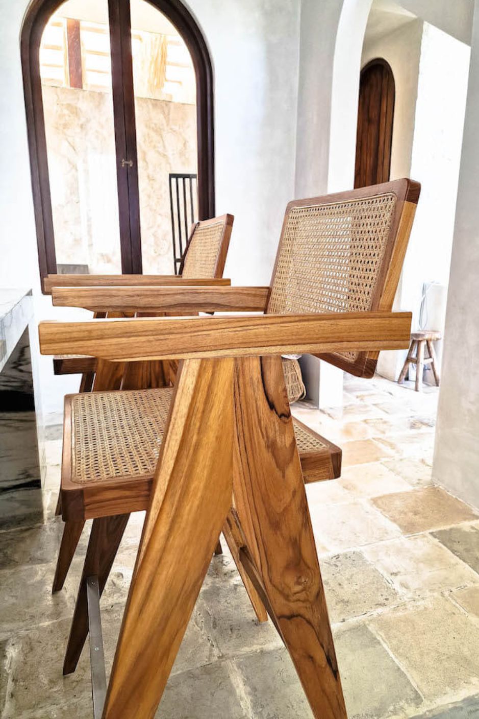 Joy Bar Stool made from durable teak wood with woven seat and backrest, ideal for kitchen islands, high countertops, and bar tables, handmade, stylish and comfortable seating for modern homes