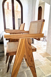 Joy Bar Stool made from durable teak wood with woven seat and backrest, ideal for kitchen islands, high countertops, and bar tables, handmade, stylish and comfortable seating for modern homes