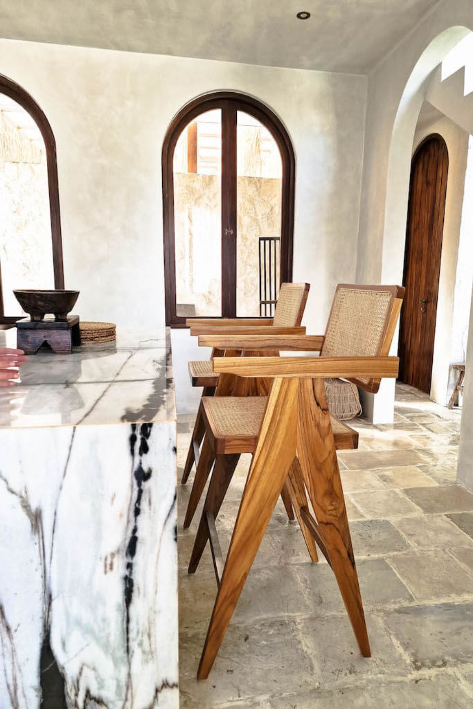 Joy Bar Stool made from durable teak wood with woven seat and backrest, ideal for kitchen islands, high countertops, and bar tables, handmade, stylish and comfortable seating for modern homes