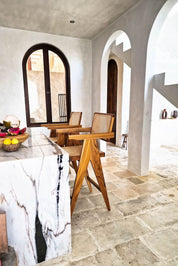 Joy Bar Stool made from durable teak wood with woven seat and backrest, ideal for kitchen islands, high countertops, and bar tables, handmade, stylish and comfortable seating for modern homes