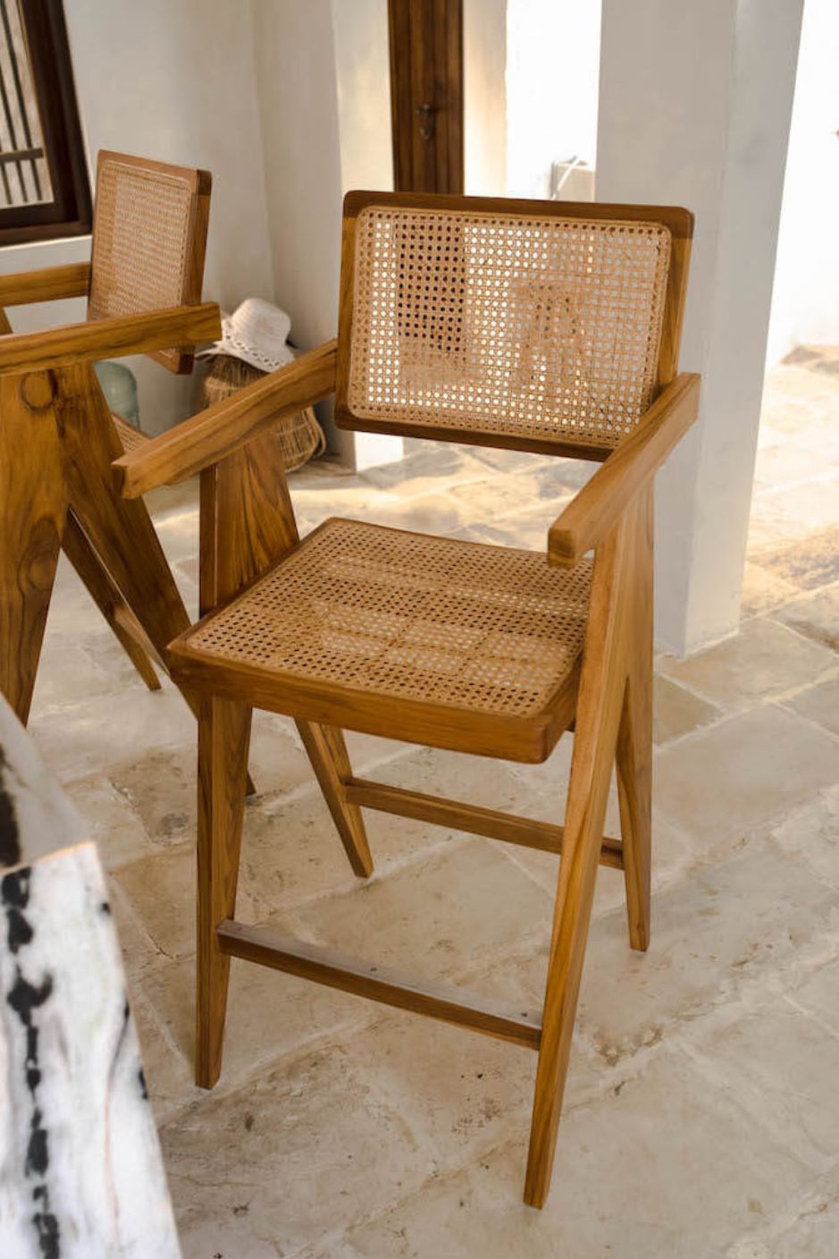 Joy Bar Stool made from durable teak wood with woven seat and backrest, ideal for kitchen islands, high countertops, and bar tables, handmade, stylish and comfortable seating for modern homes