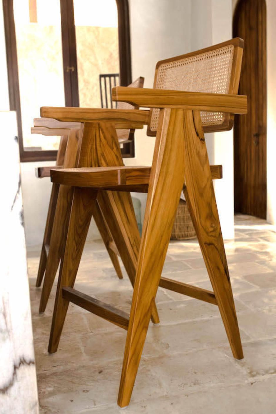 Joy Bar Stool made from durable teak wood with woven seat and backrest, ideal for kitchen islands, high countertops, and bar tables, handmade, stylish and comfortable seating for modern homes