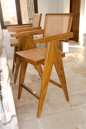Joy Bar Stool made from durable teak wood with woven seat and backrest, ideal for kitchen islands, high countertops, and bar tables, handmade, stylish and comfortable seating for modern homes