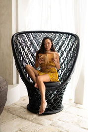 Rattan accent chair styled in living room interior
