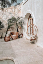 Koboo double handmade durable brown rattan hanging chair for indoor living rooms, covered terraces, patios, balconies, and outdoor gardens