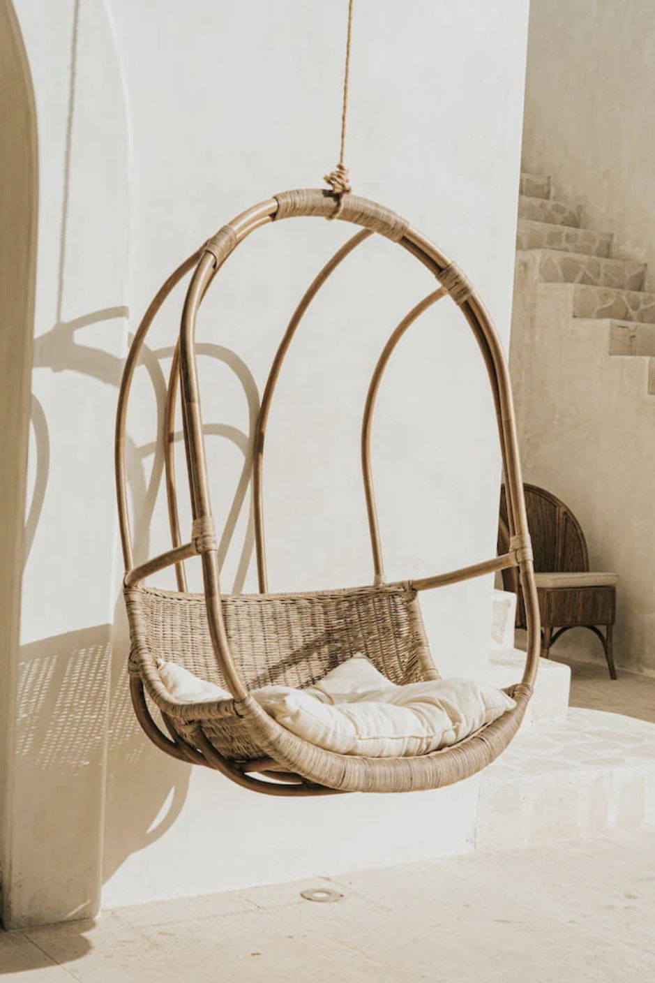 Koboo double handmade durable brown rattan hanging chair for indoor living rooms, covered terraces, patios, balconies, and outdoor gardens